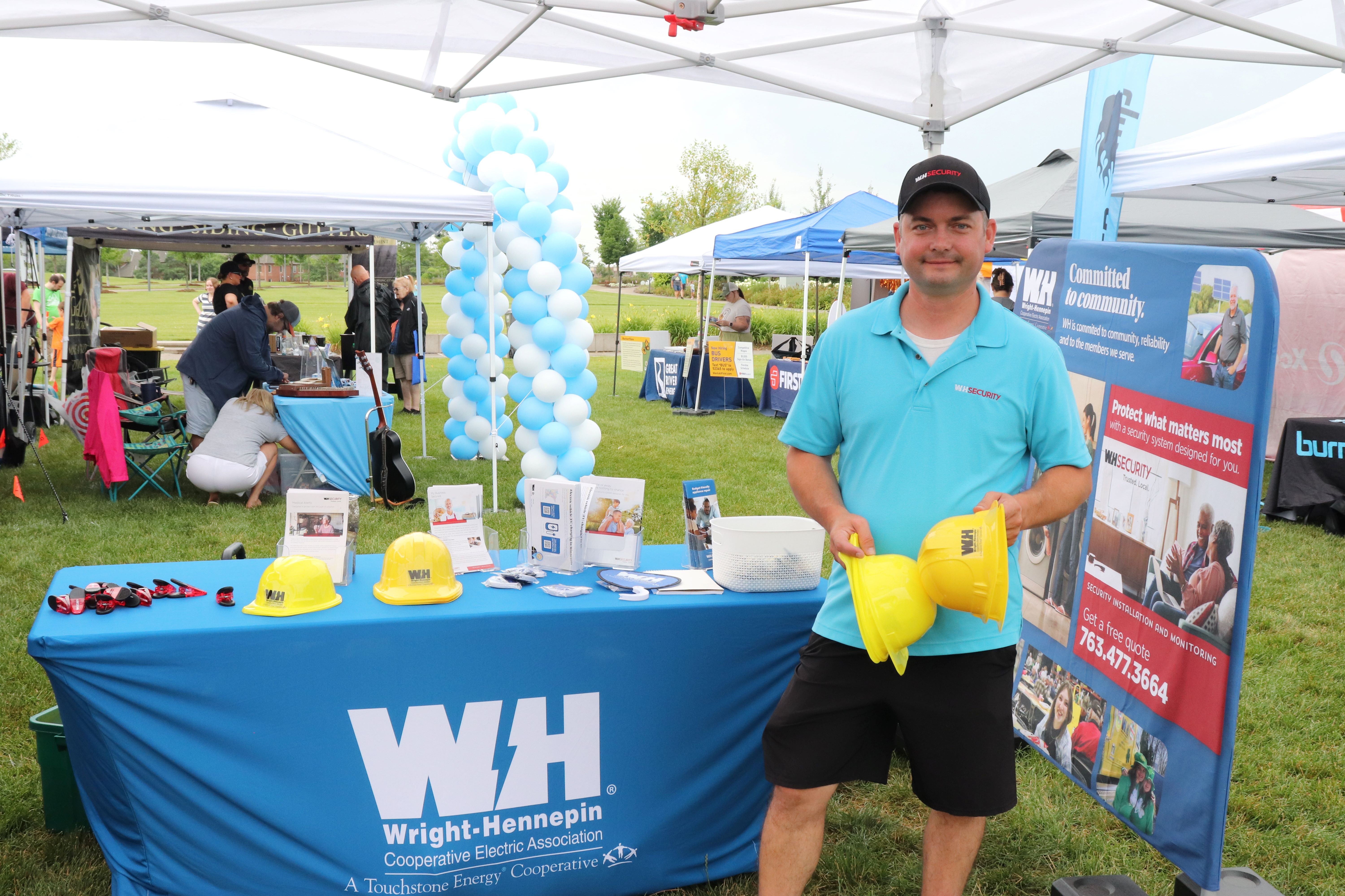 Security technician at booth at fair